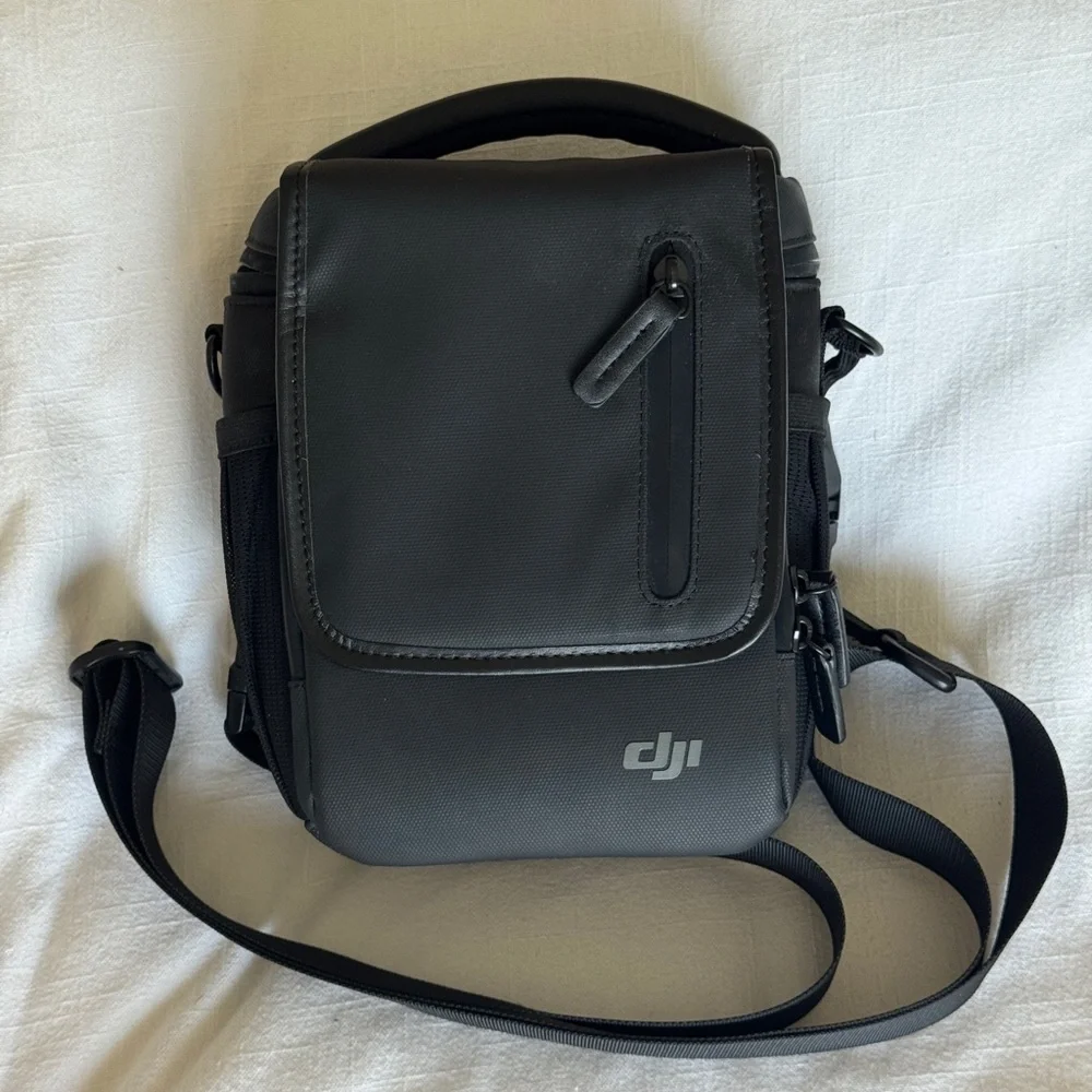 DJI Mavic Black Messenger Bag with Adjustable Strap and Minimalist Design
